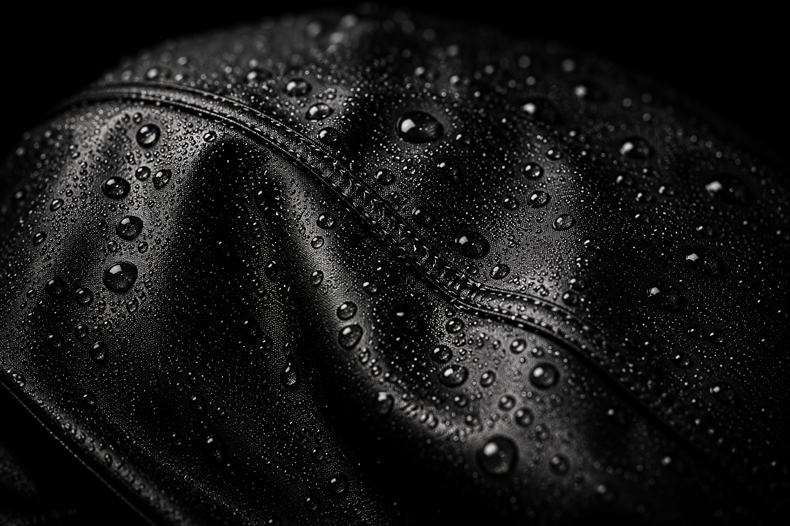 Macro detail of water beading on Aqua X water resistant fabric